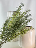 Artificial Bloom artificial rosemary botanical stem with realistic green needle-like leaves in a decorative vase