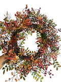 Artificial Bloom autumn harvest wreath with maple leaves and berries on a rustic twig base for seasonal home decor