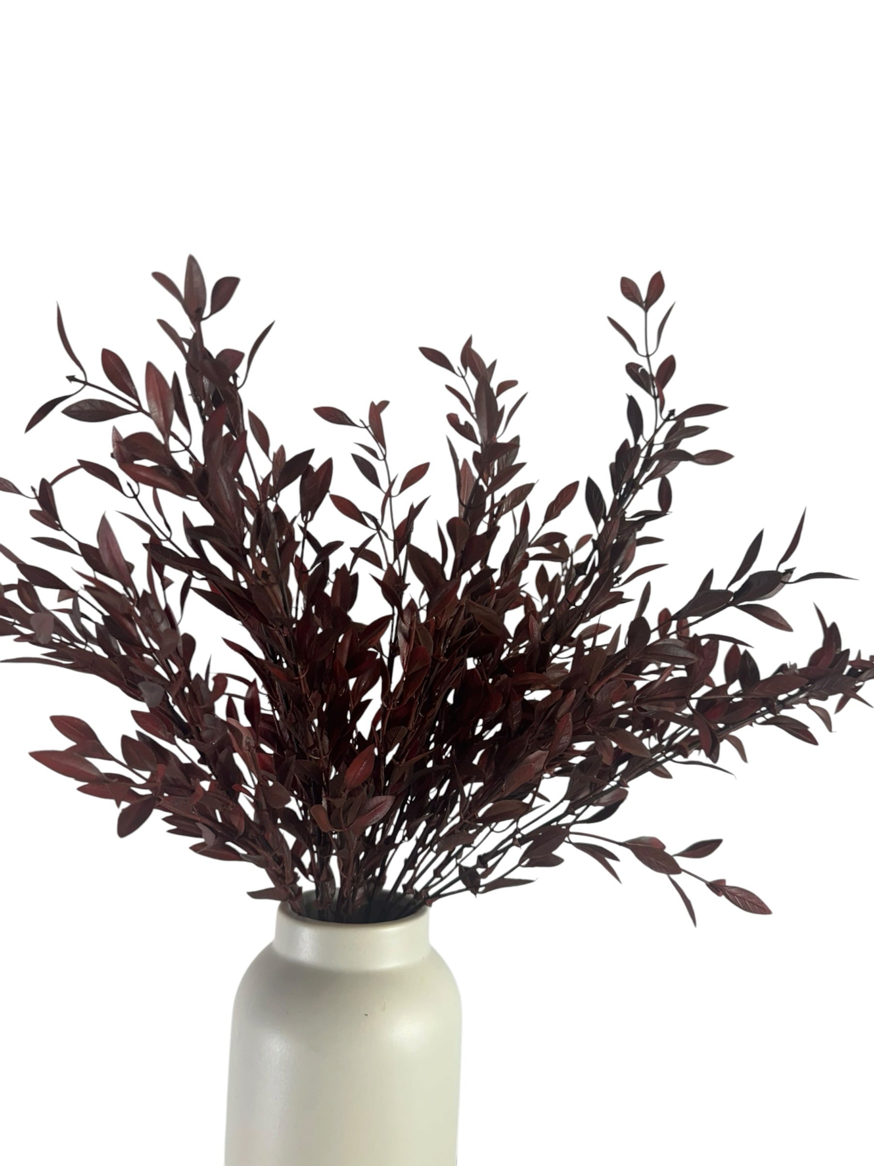 Artificial Bloom deep burgundy faux leafy branches in a minimalist white ceramic vase for home decor