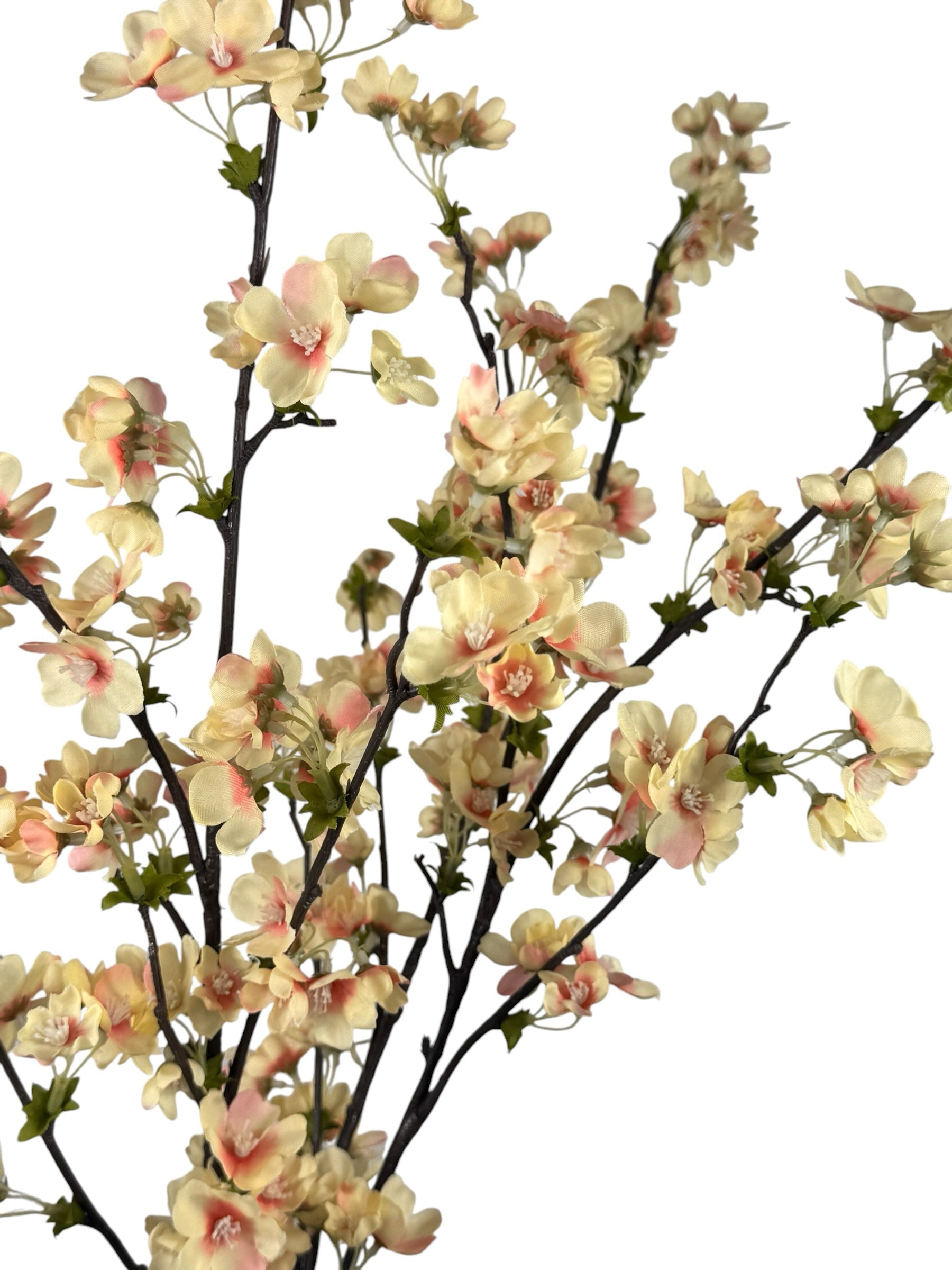 Artificial Bloom artificial cherry blossom branch with cream petals and blush pink centers on dark textured stems