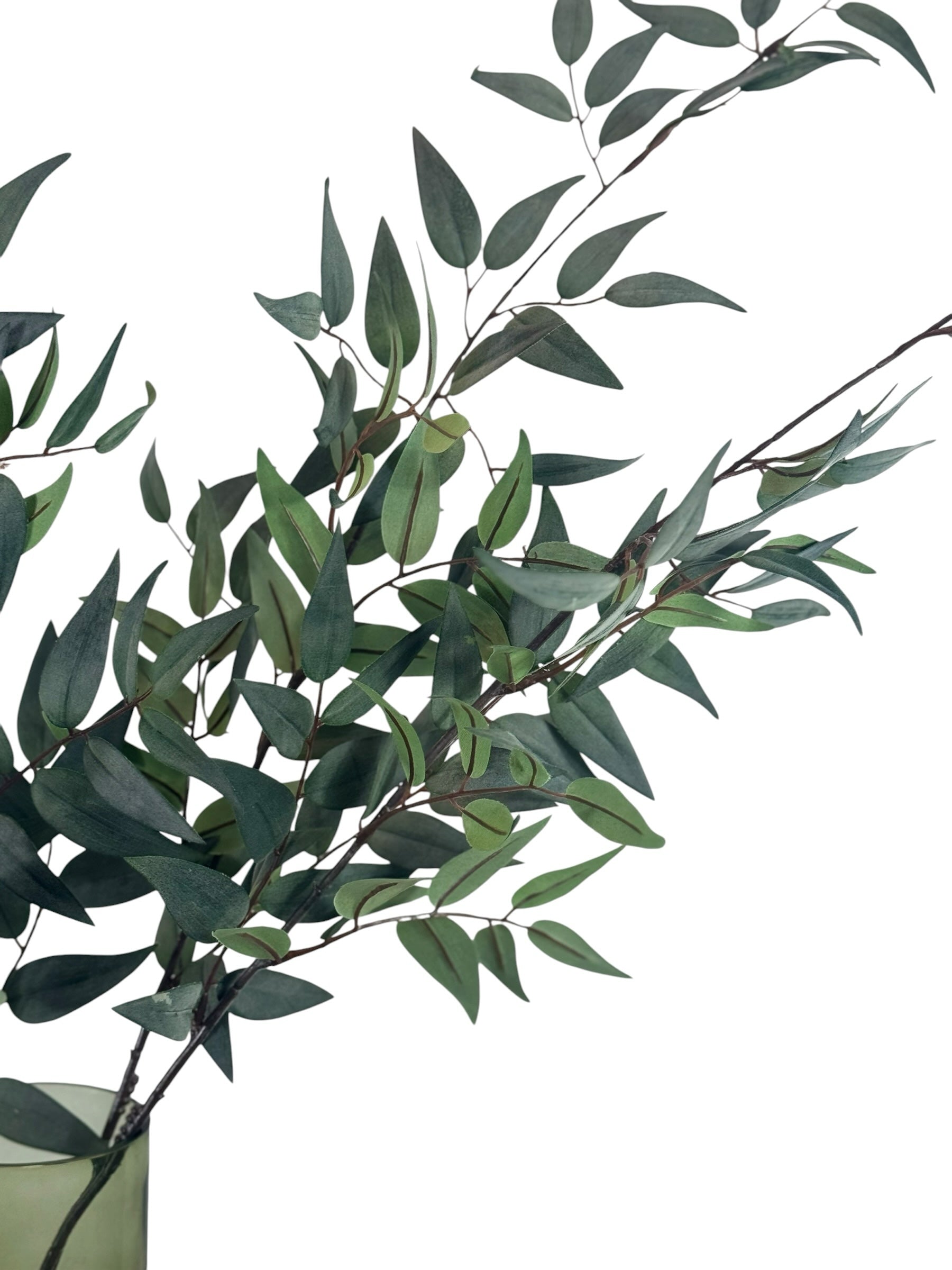 Artificial Bloom eucalyptus stem with realistic deep green leaves in a glass vase for home decor