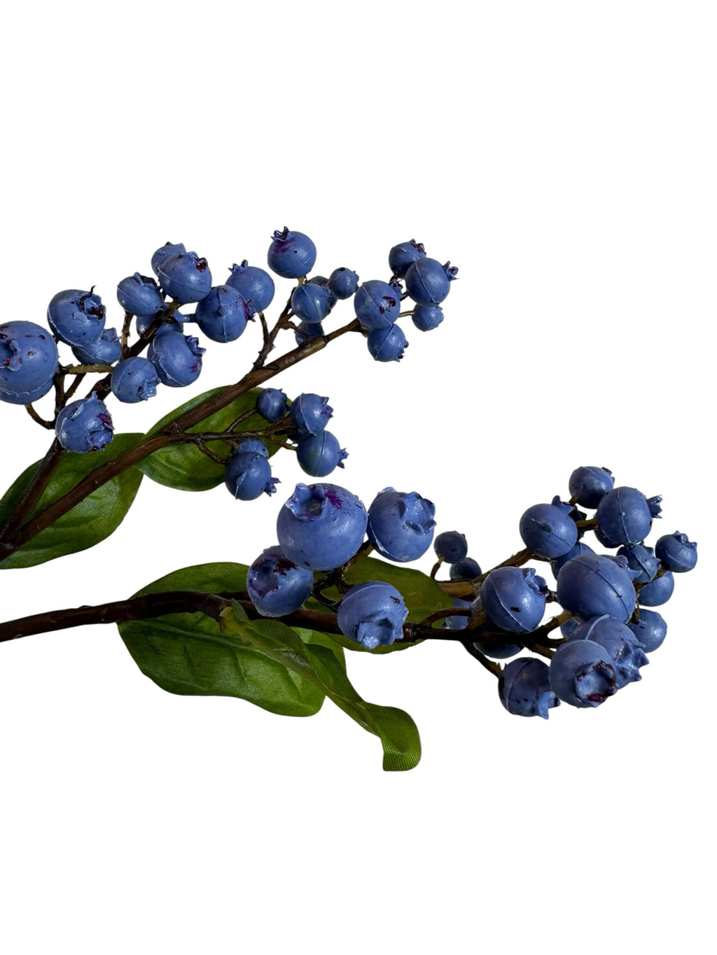 Artificial Bloom faux blueberry stem with realistic deep blue berries and vibrant green leaves on a brown branch