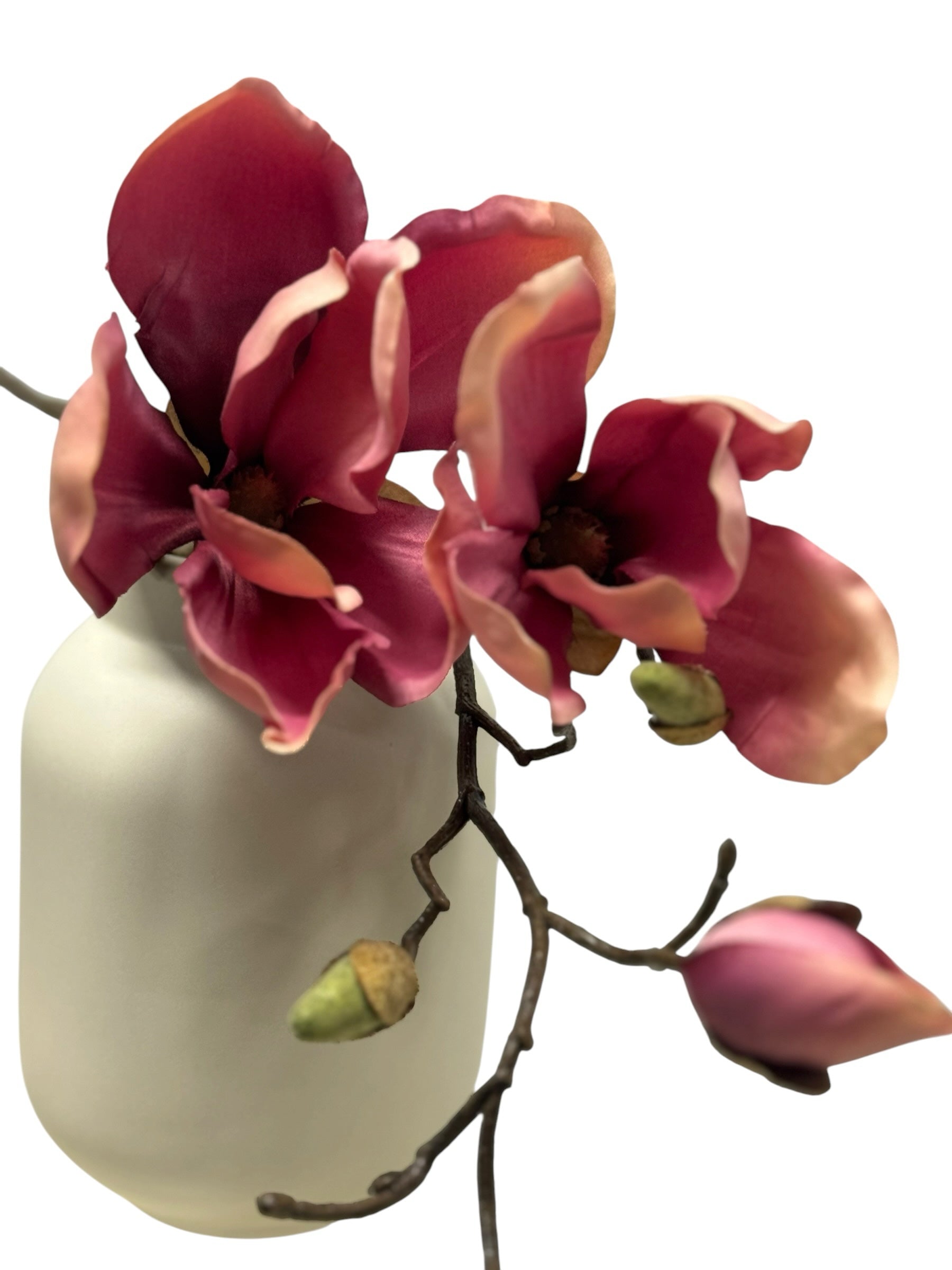 Artificial Bloom magenta and pink velvet magnolia floral stem in a minimalist white vase for home decor