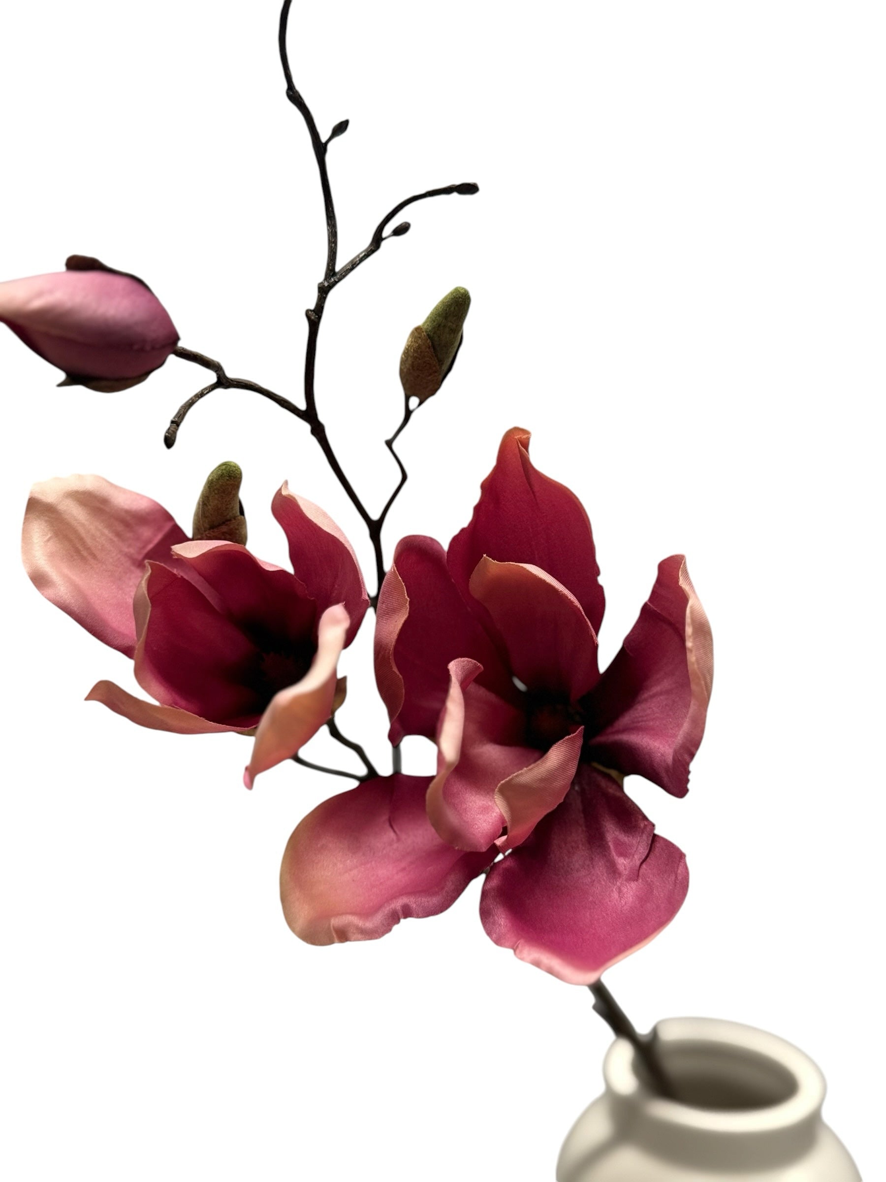 Artificial Bloom magenta and pink velvet magnolia floral stem with buds in a white ceramic vase