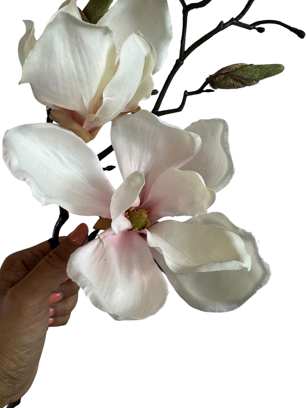 Artificial Bloom artificial magnolia flower stem with creamy white petals, pink centers, and a dark rustic branch.