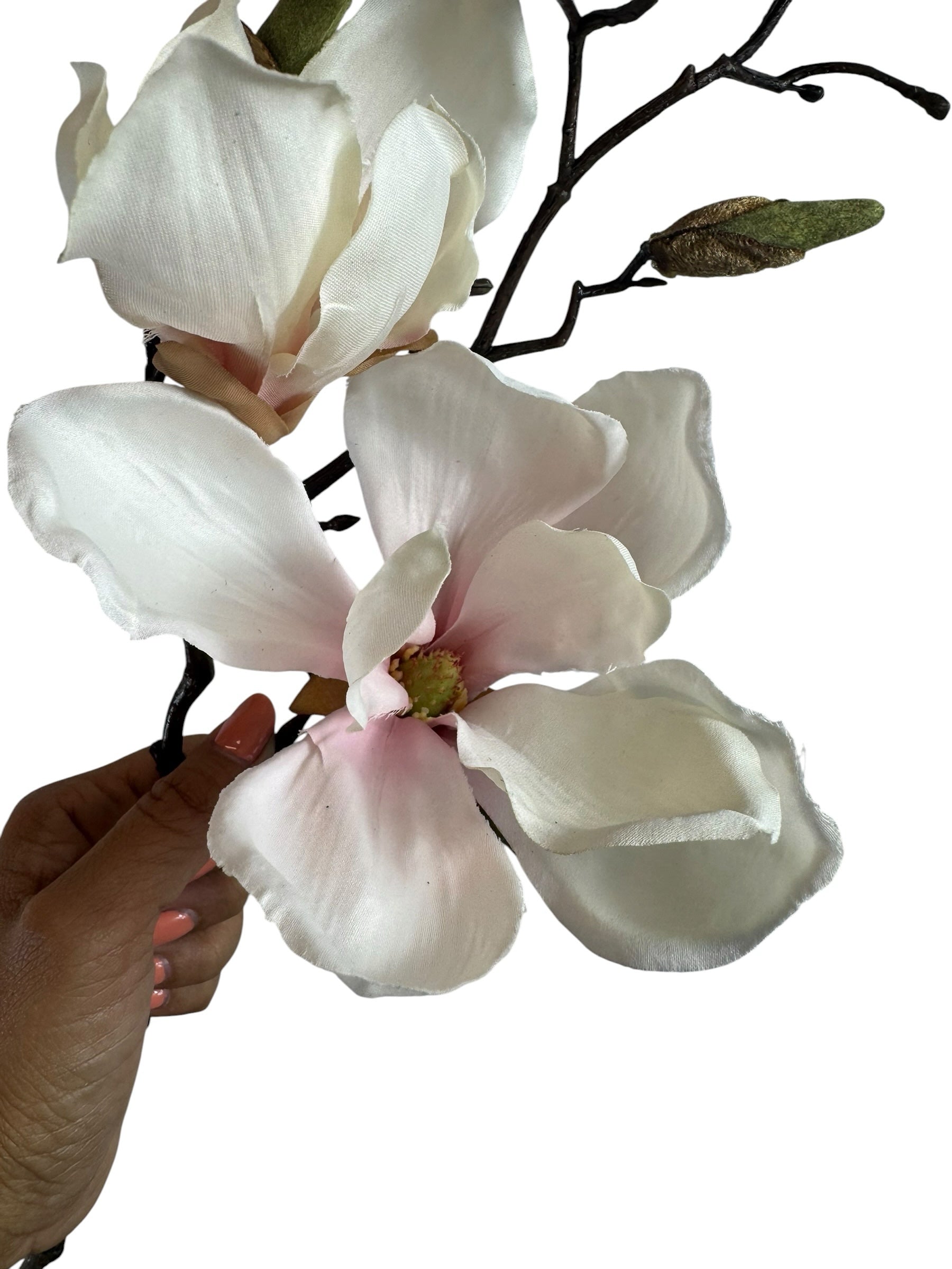Artificial Bloom artificial magnolia flower stem with creamy white petals, pink centers, and a dark rustic branch.