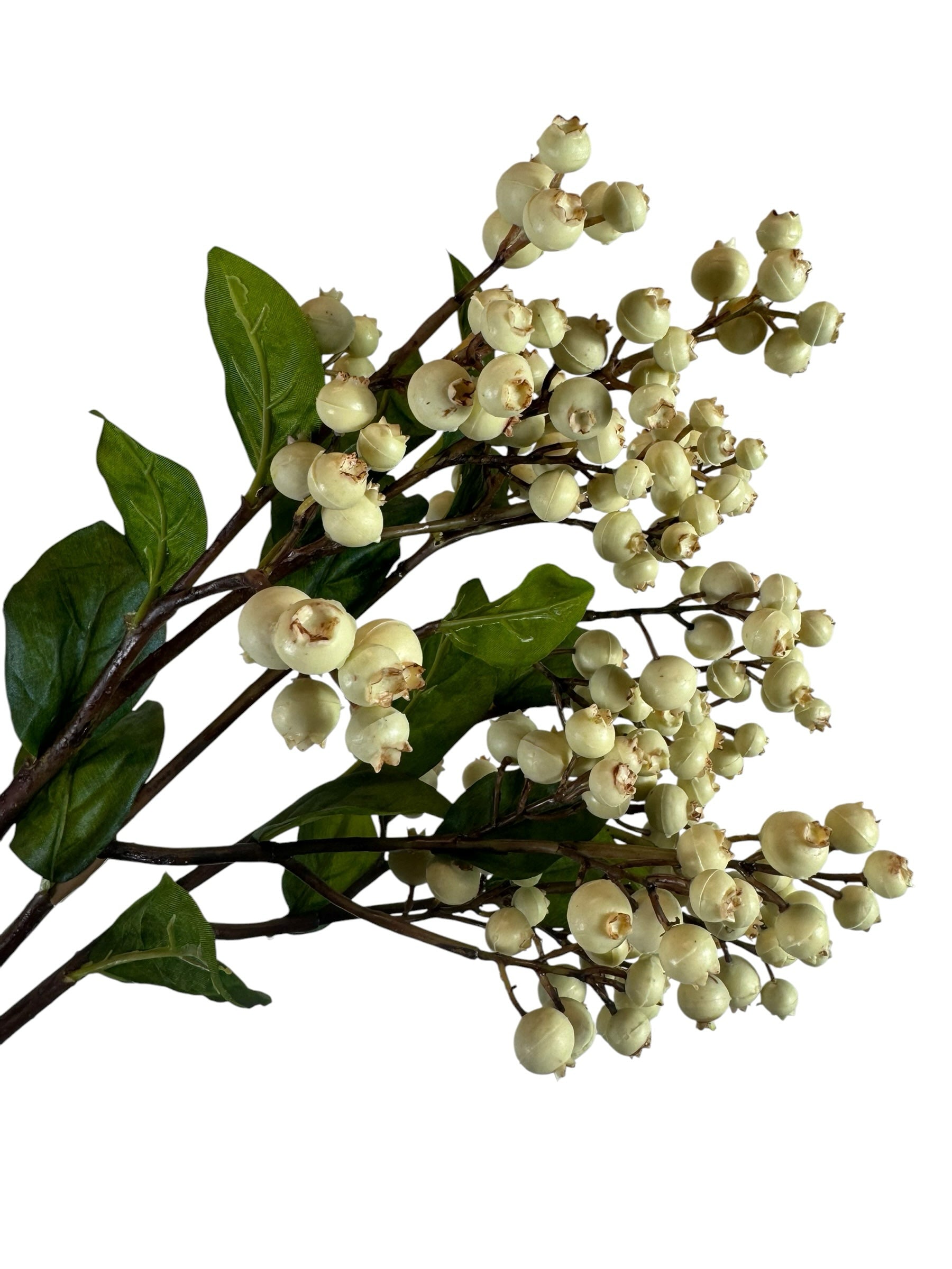 Artificial Bloom decorative floral stem with creamy off-white berries and deep green leaves on a slender branch