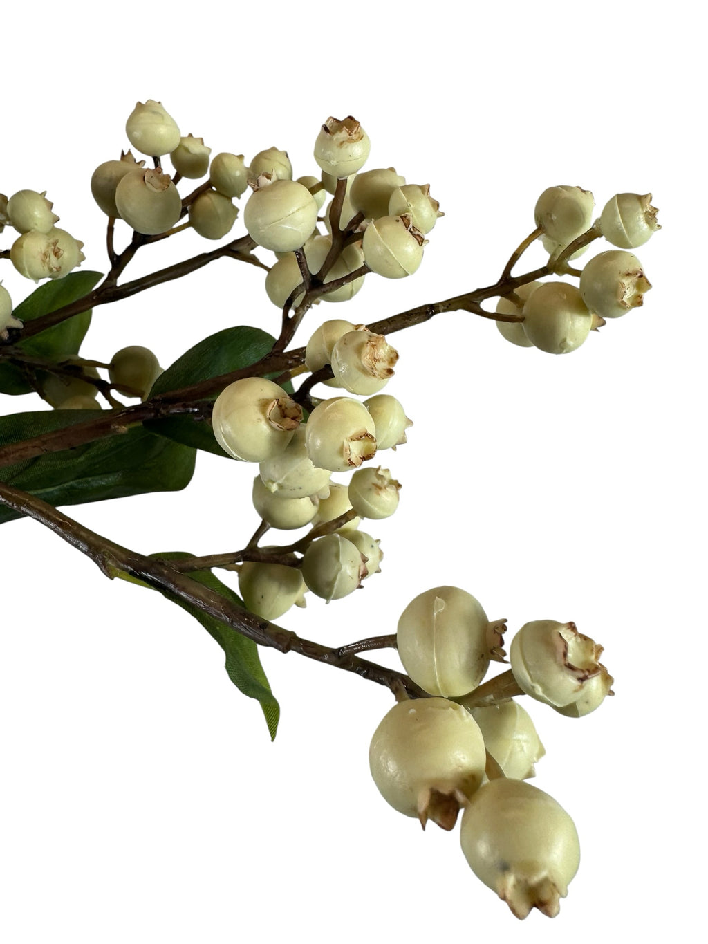 Artificial Bloom decorative floral stem featuring creamy off-white berries and green leaves on a slender brown branch