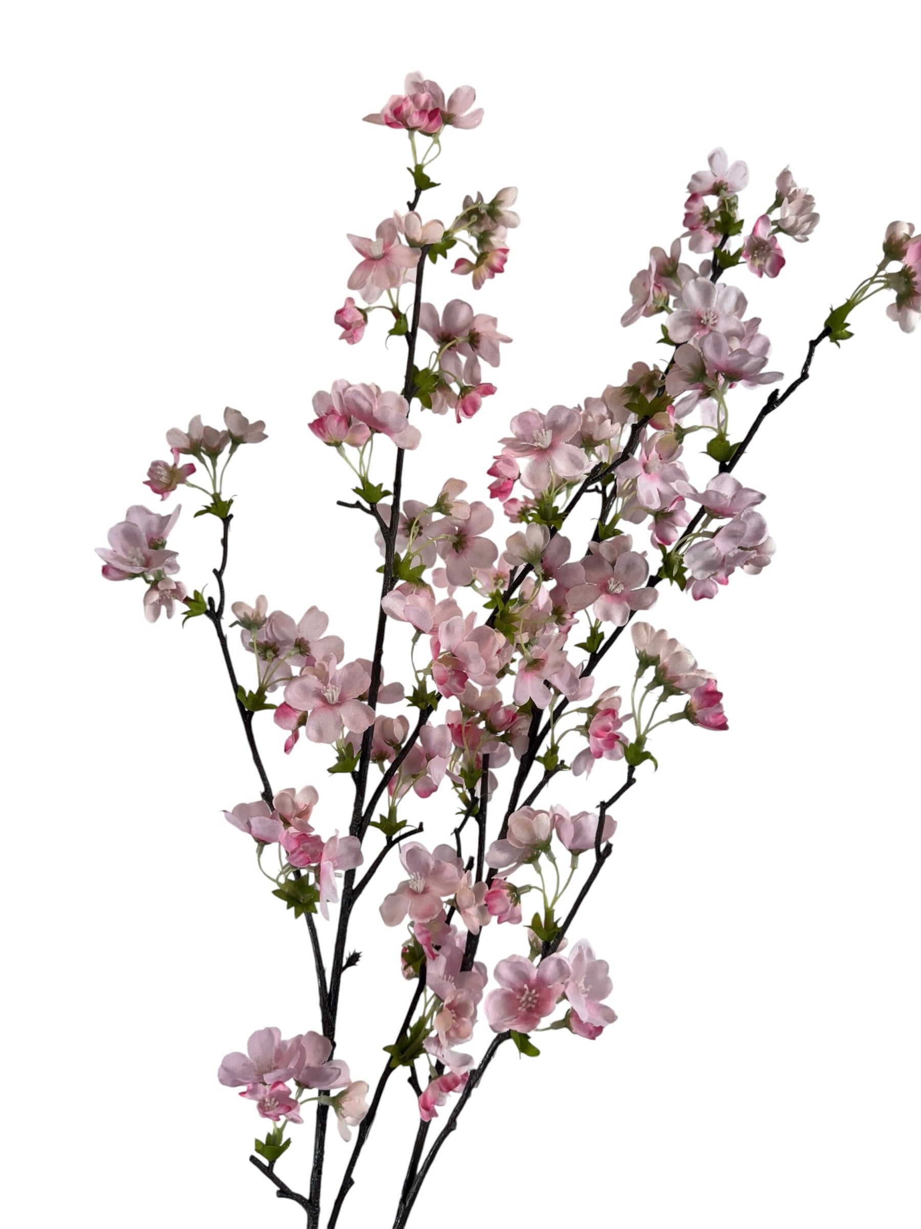 Artificial Bloom artificial cherry blossom stem with delicate soft pink petals on a dark textured branch