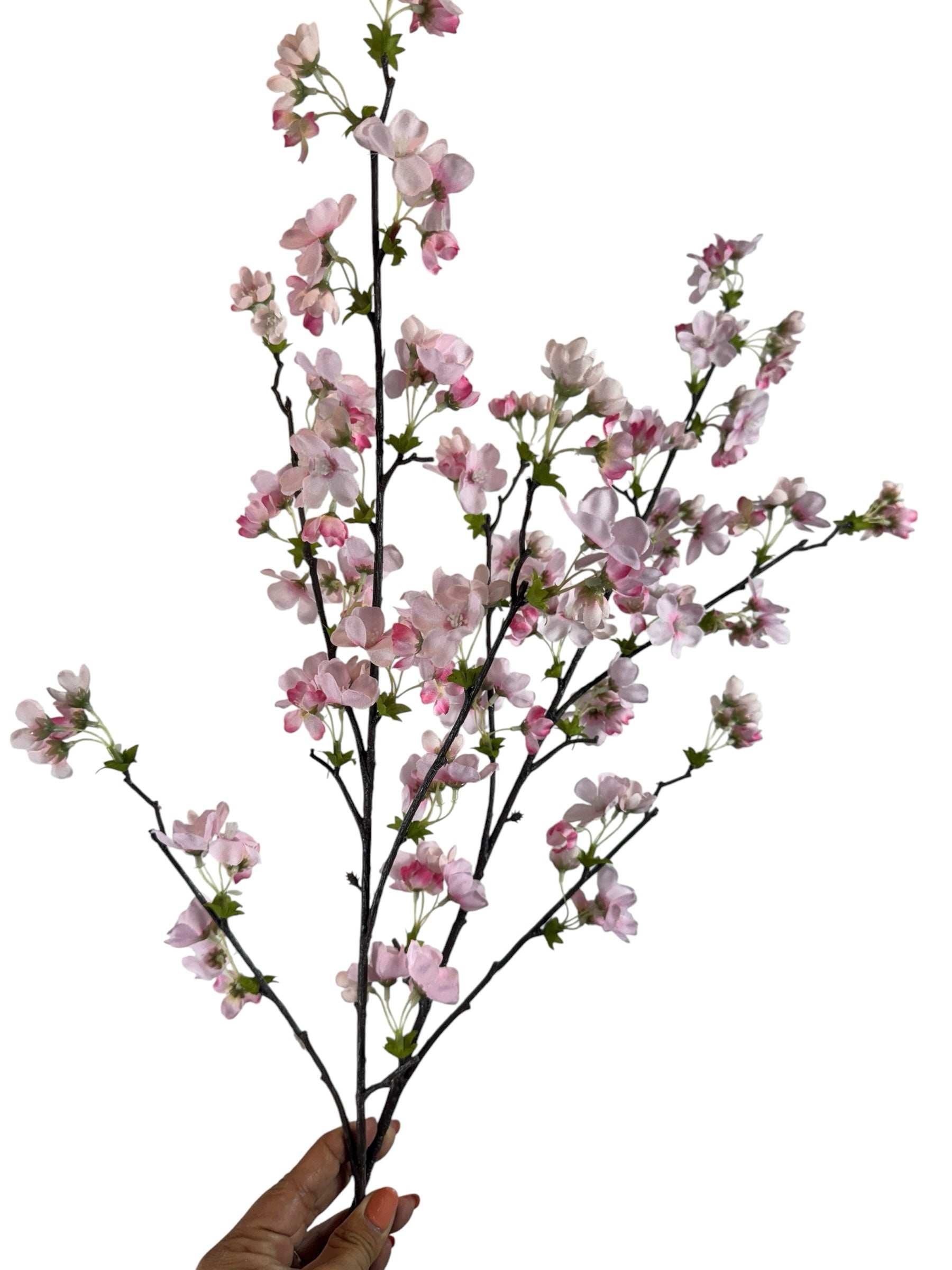 Artificial Bloom artificial cherry blossom stem with delicate soft pink petals and a realistic dark textured branch